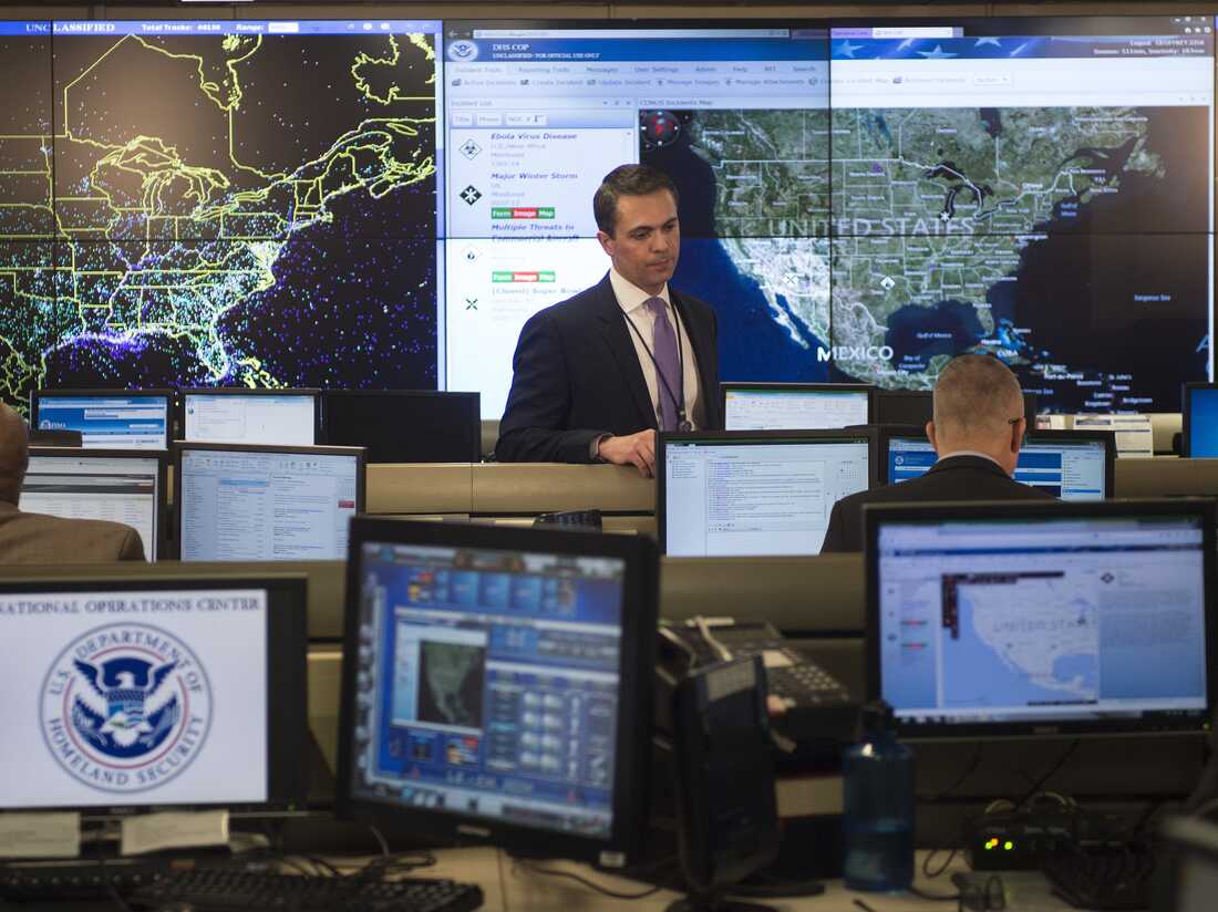 Government security operations center with legacy systems monitoring national infrastructure
